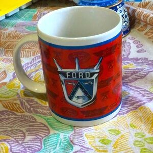 Official licensed FORD MOTOR COMPANY MUG. Red&blue stripe and emblem on 2 sides.